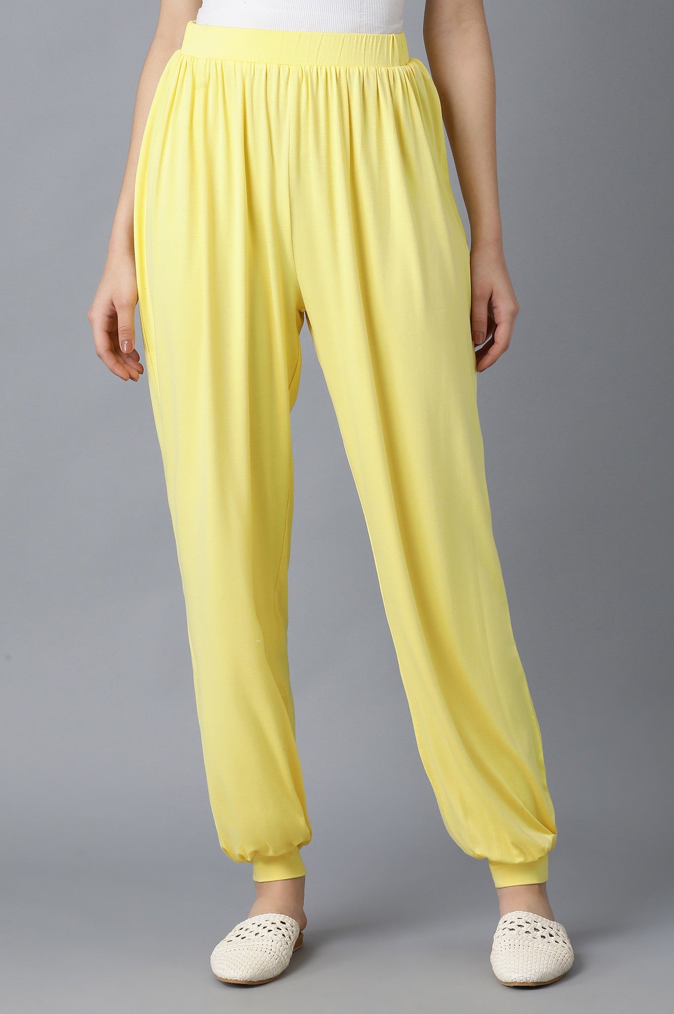 Yellow Solid Flared Pants With Elasticated Waist