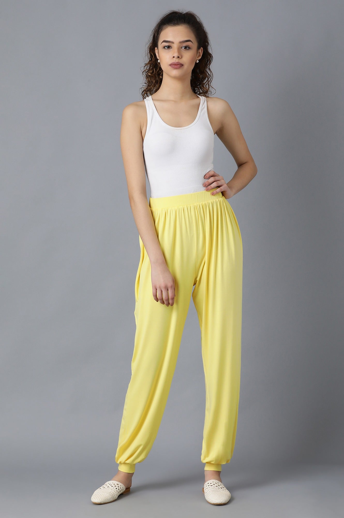 Yellow Solid Flared Pants With Elasticated Waist