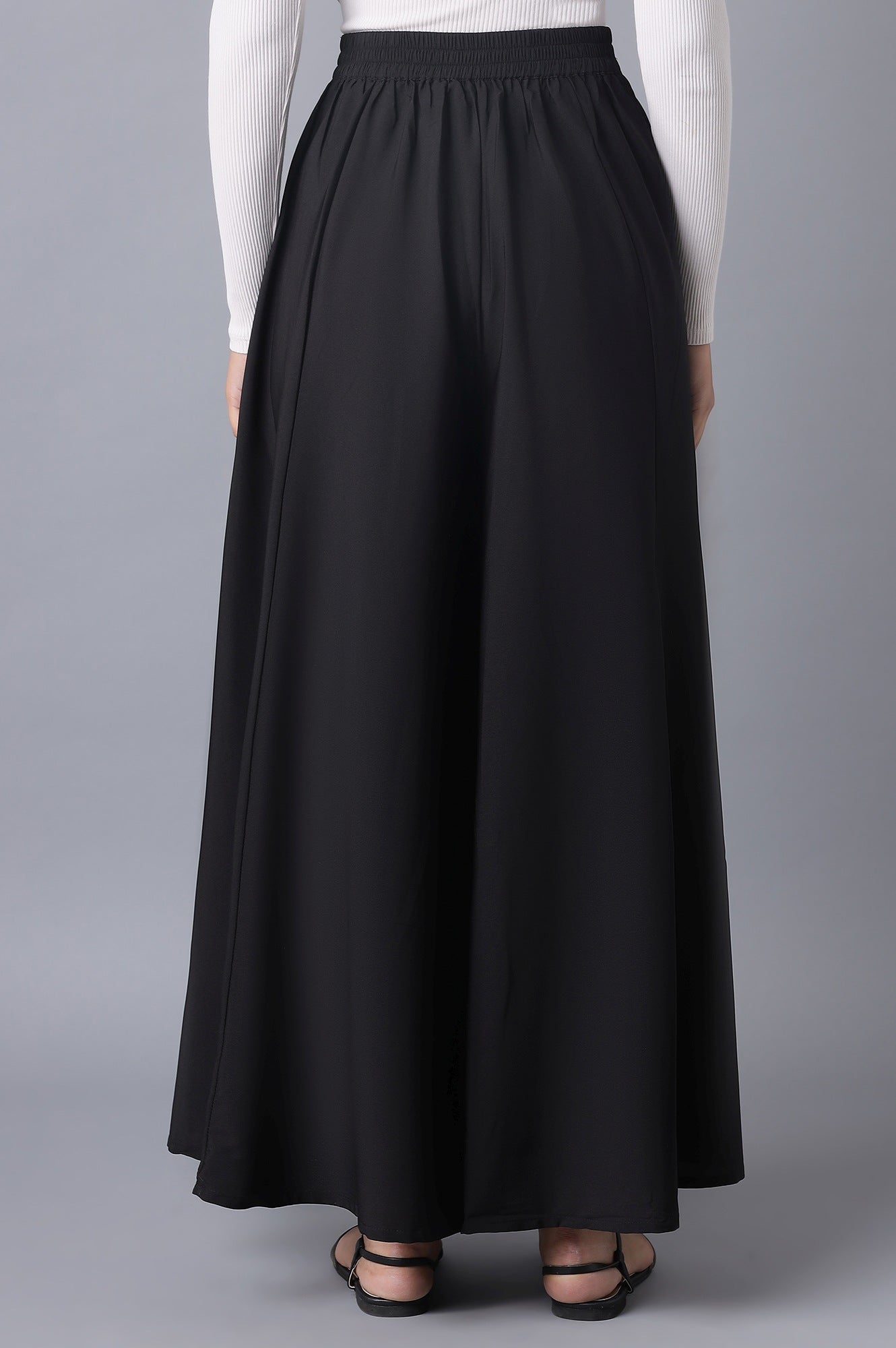 Black Solid Flared Woven Palazzo With Elasticated Waist