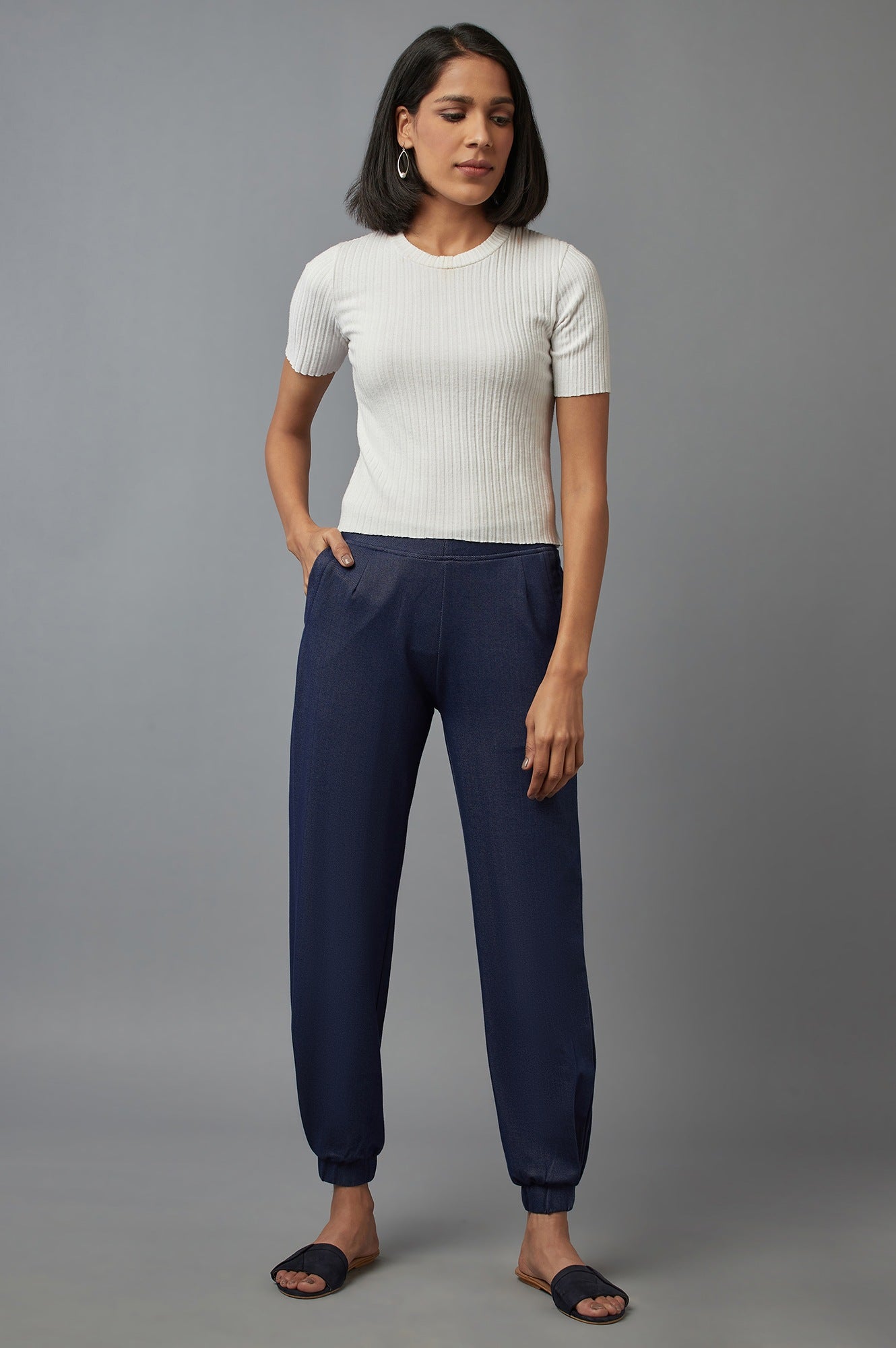 Navy Blue Solid Tapered Cotton Pants With Pleated Detail