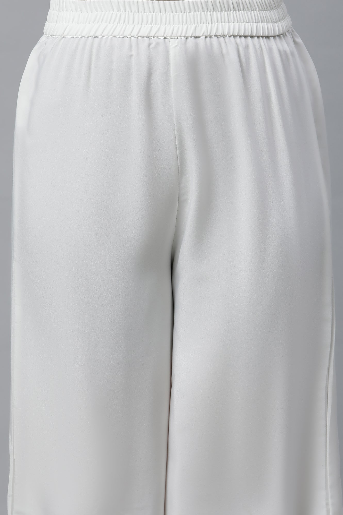 White Solid Straight Fit Woven Palazzo With Elasticated Waist