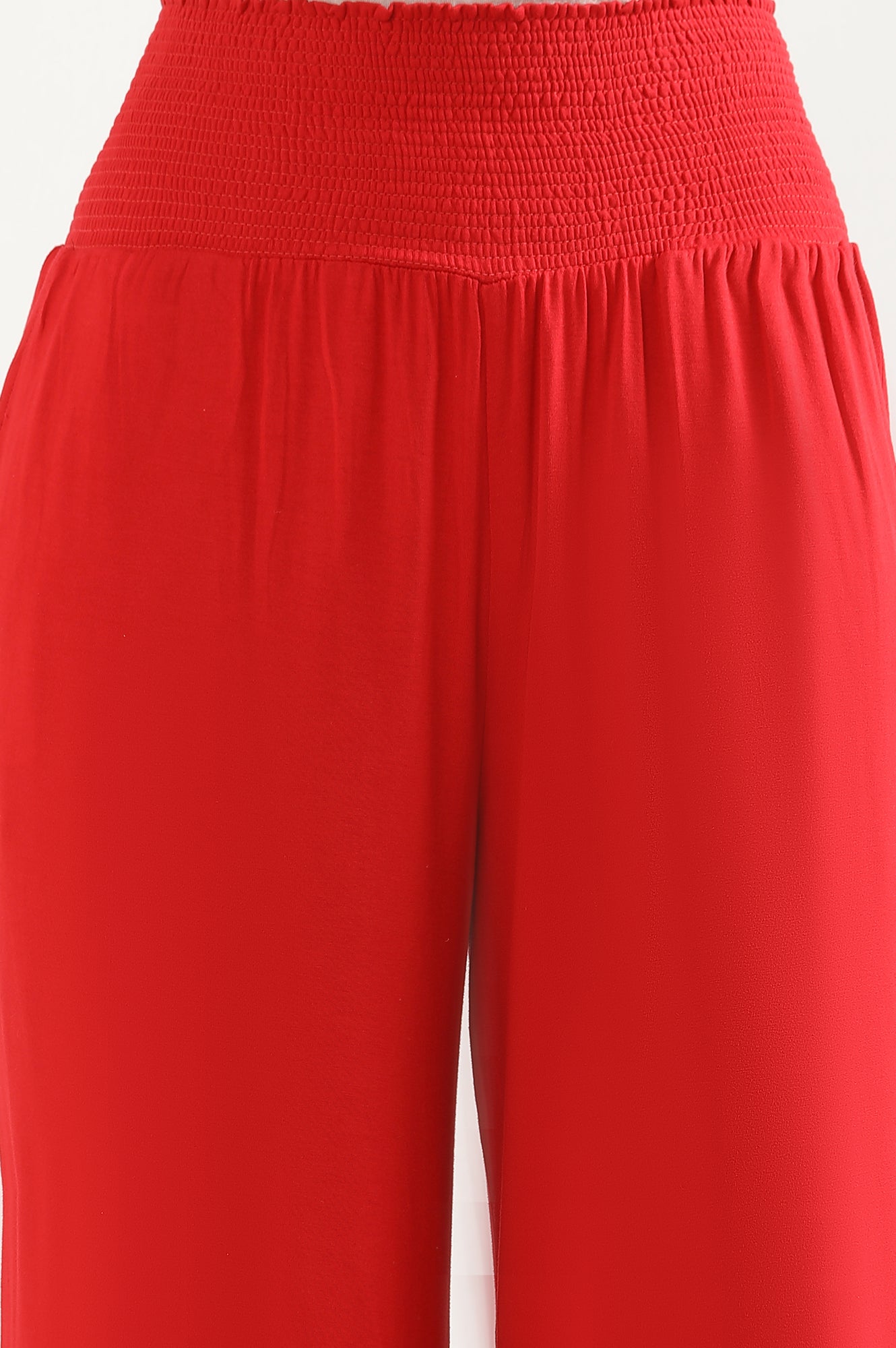 Red Solid Flared Pants With Smocked Waistbelt