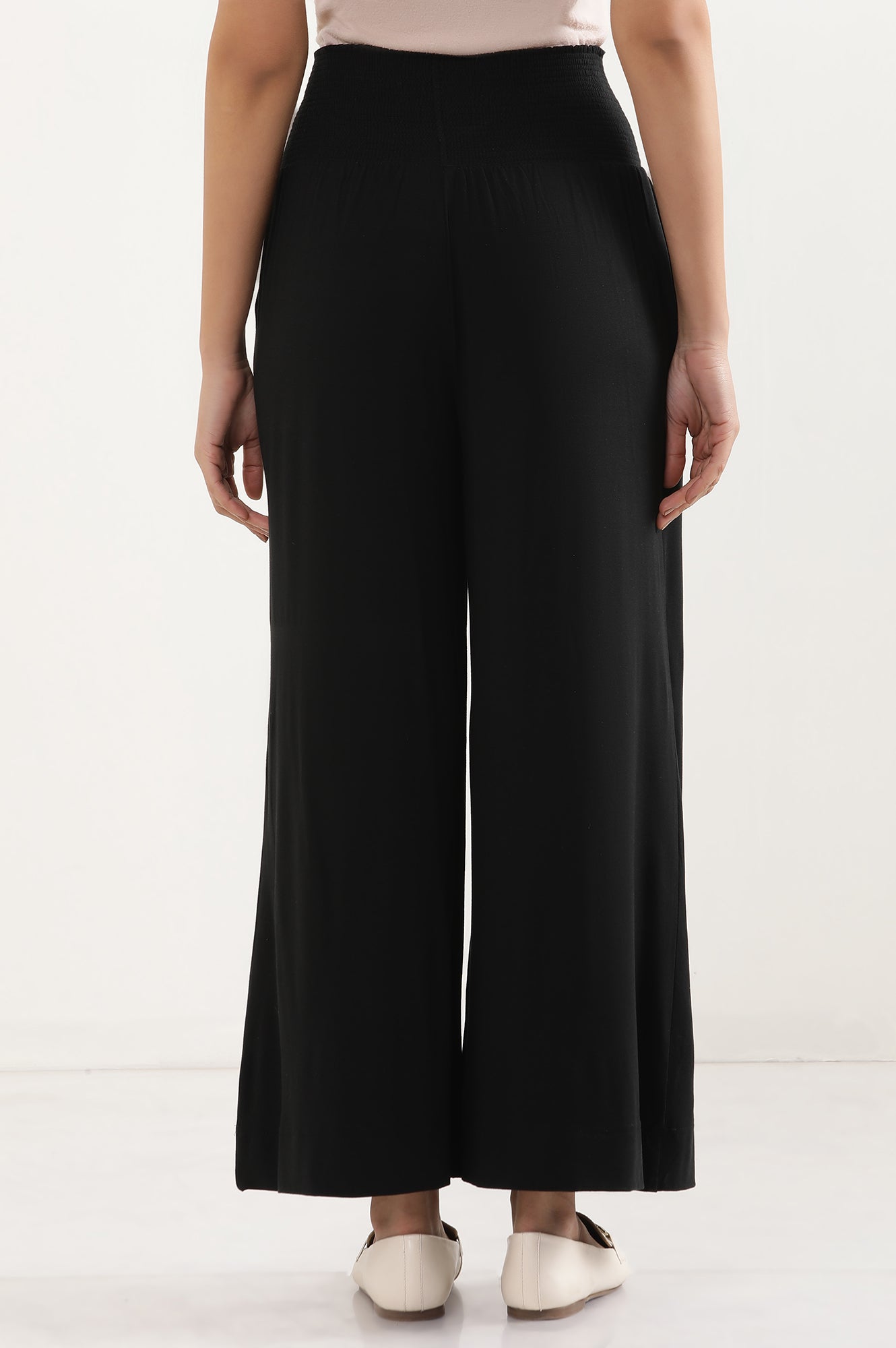 Black Solid Flared Pants With Smocked Waistbelt