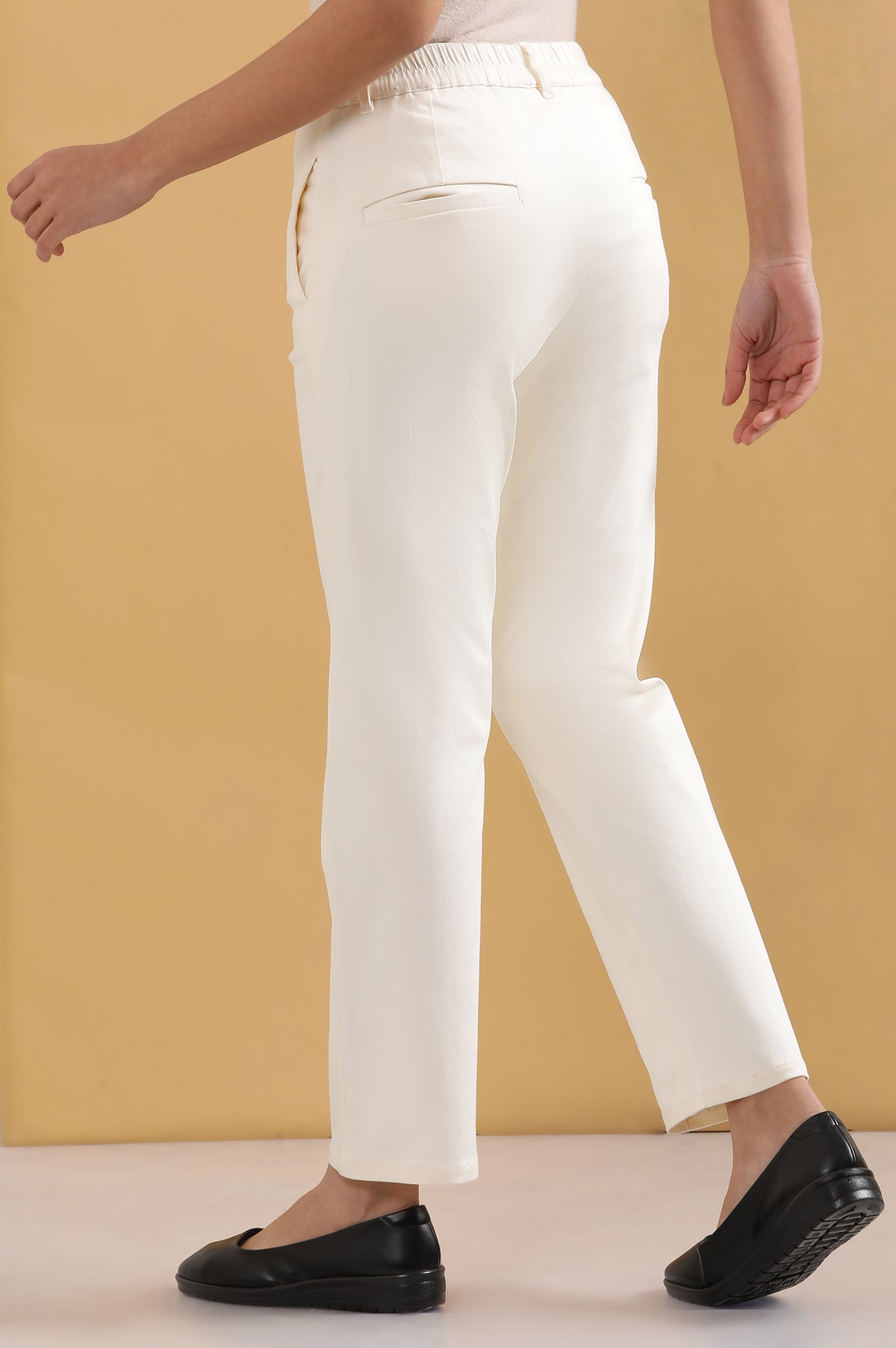Off White Solid Straight Fit Cotton Pants With Pintuck Detail