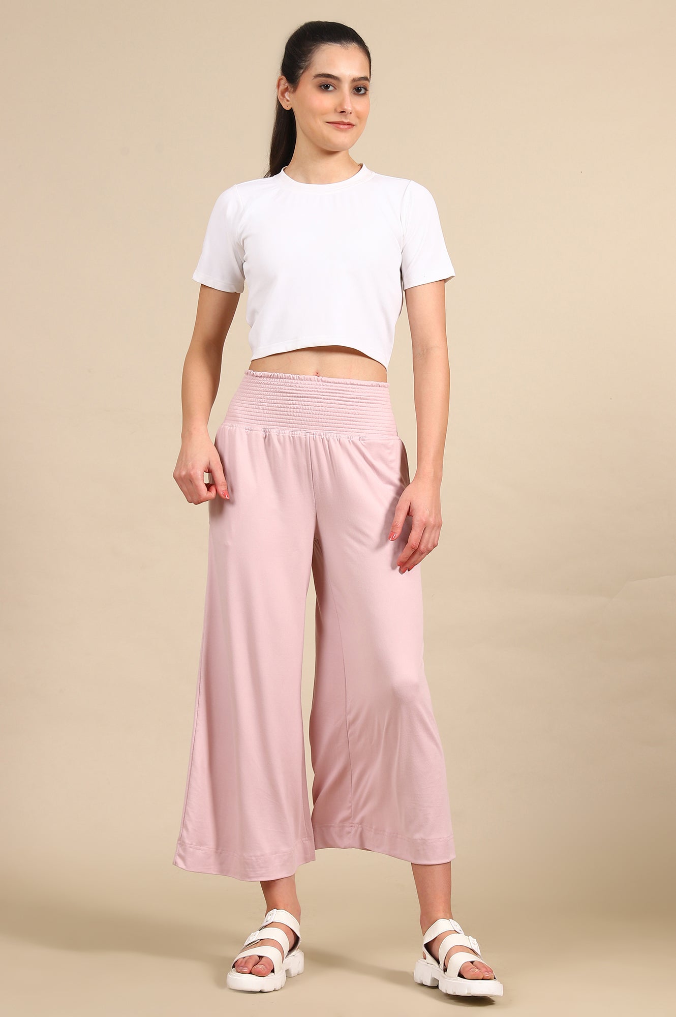 Pink Solid Flared Pants With Smoked High Waisted Detail