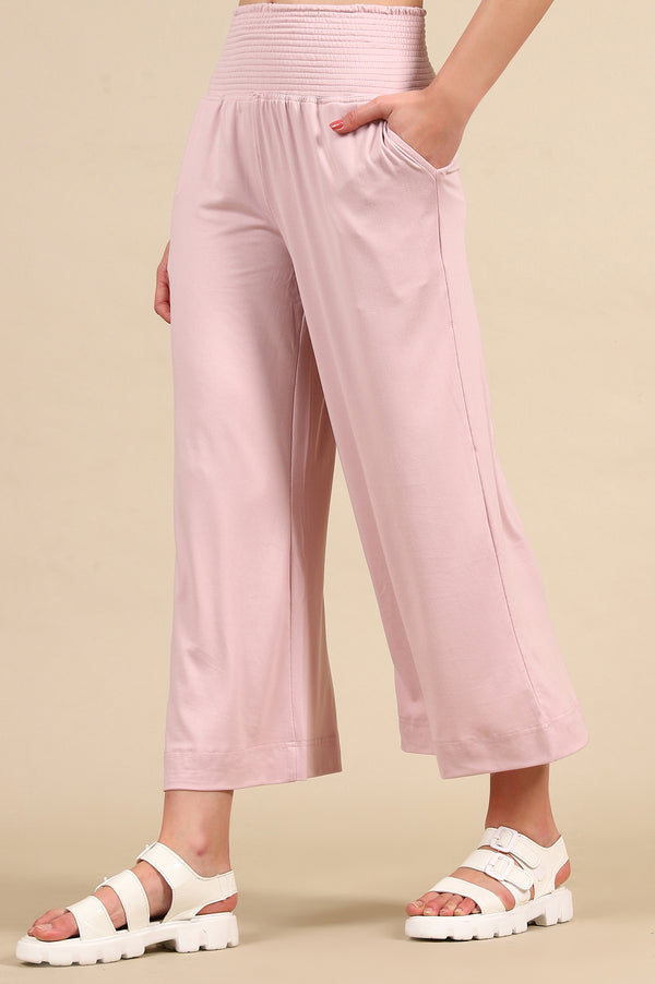 Pink Solid Flared Pants With Smoked High Waisted Detail