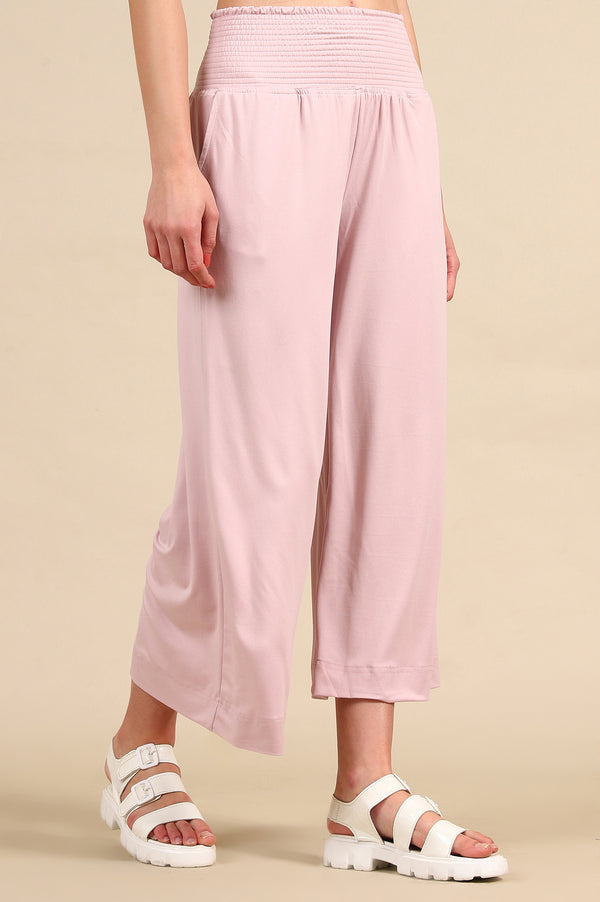 Pink Solid Flared Pants With Smoked High Waisted Detail