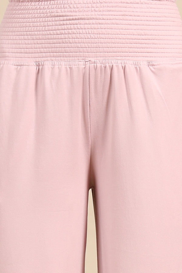 Pink Solid Flared Pants With Smoked High Waisted Detail