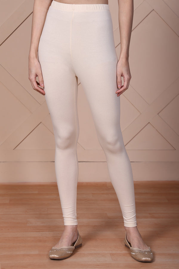 Cream Solid Cotton Tight