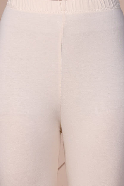 Cream Solid Cotton Tight