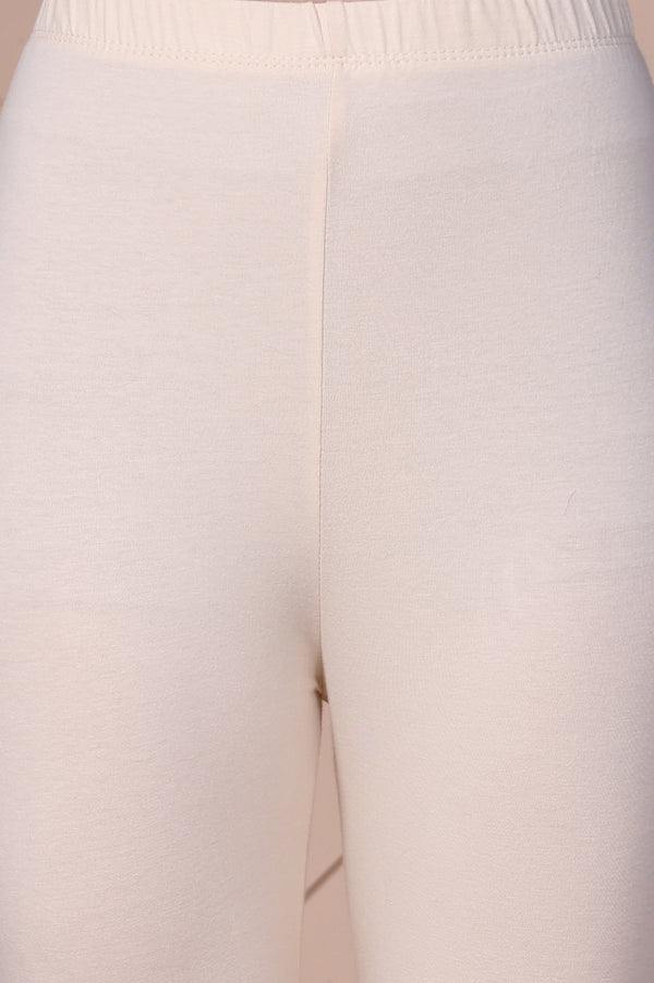 Cream Solid Cotton Tight