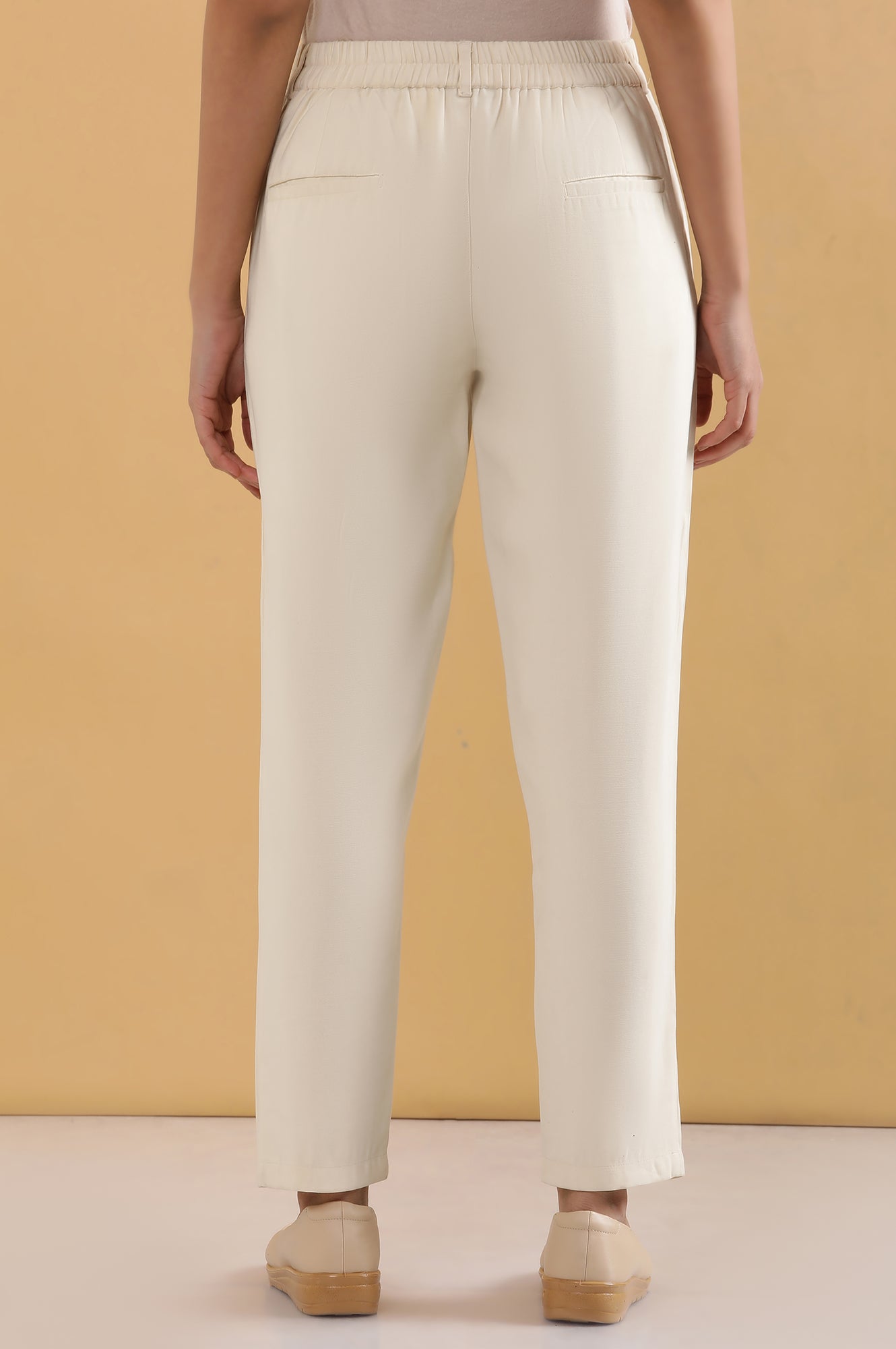 Cream Solid Tapered Rayon Trouser