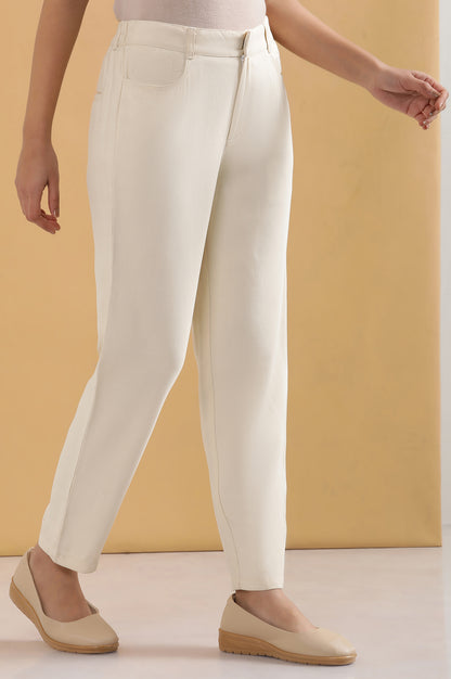 Cream Solid Tapered Rayon Trouser